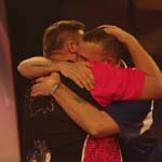 Last 16 - Scott and Mark Hug - Photo by Mark Sandom